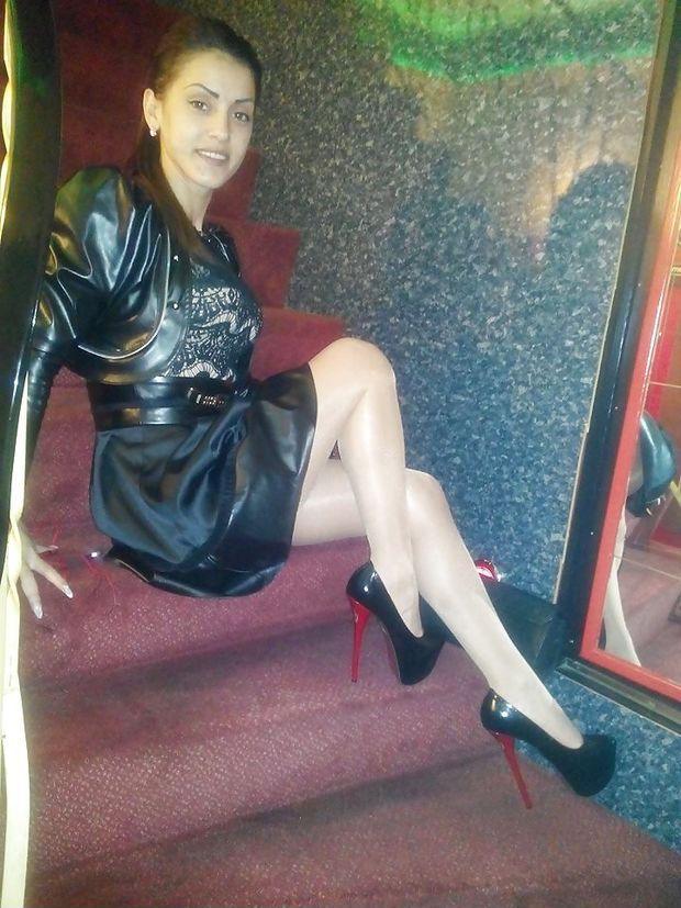 Dark Haired In Leather Miniskirt & Shiny Heels