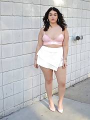 Tiny Pink Top And Short White Skirt With Heels