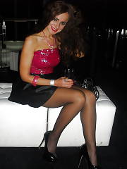 Sexual Party Girl In Really Short Flared Skirt And Shiny Pumps