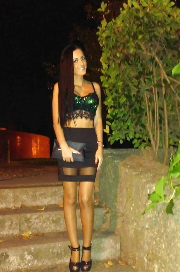 Cool Dark Haired Posing Outdoors In Really Hot Outfit