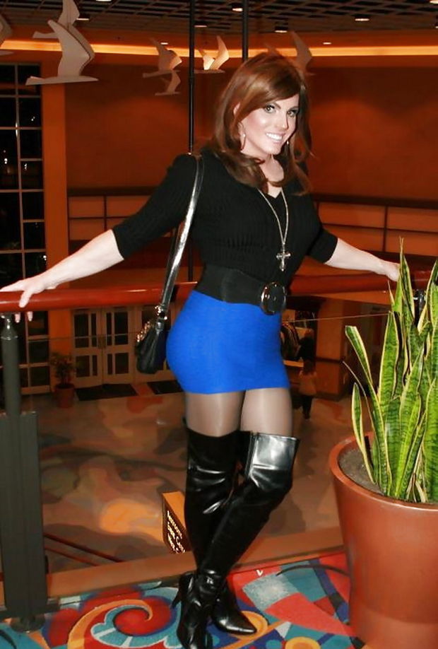 Foxy In Sexual Blue Miniskirt & Leather Boots