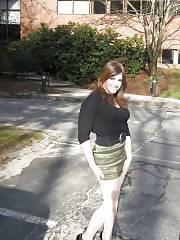 Cool Leggy Redhead Nymph Posing Outdoors In Mini Skirt