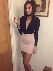 Classy Beauty Drinking Wine In A Tight Skirt That Faintly Shows Off Her Pantylines