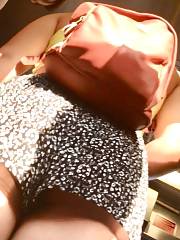 Sweetie In Flower Shorts Riding Train